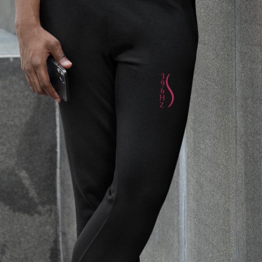 396 Hz Fear to Freedom embroidery on black joggers – spiritual frequencywear™ in Eclipse black with side leg design