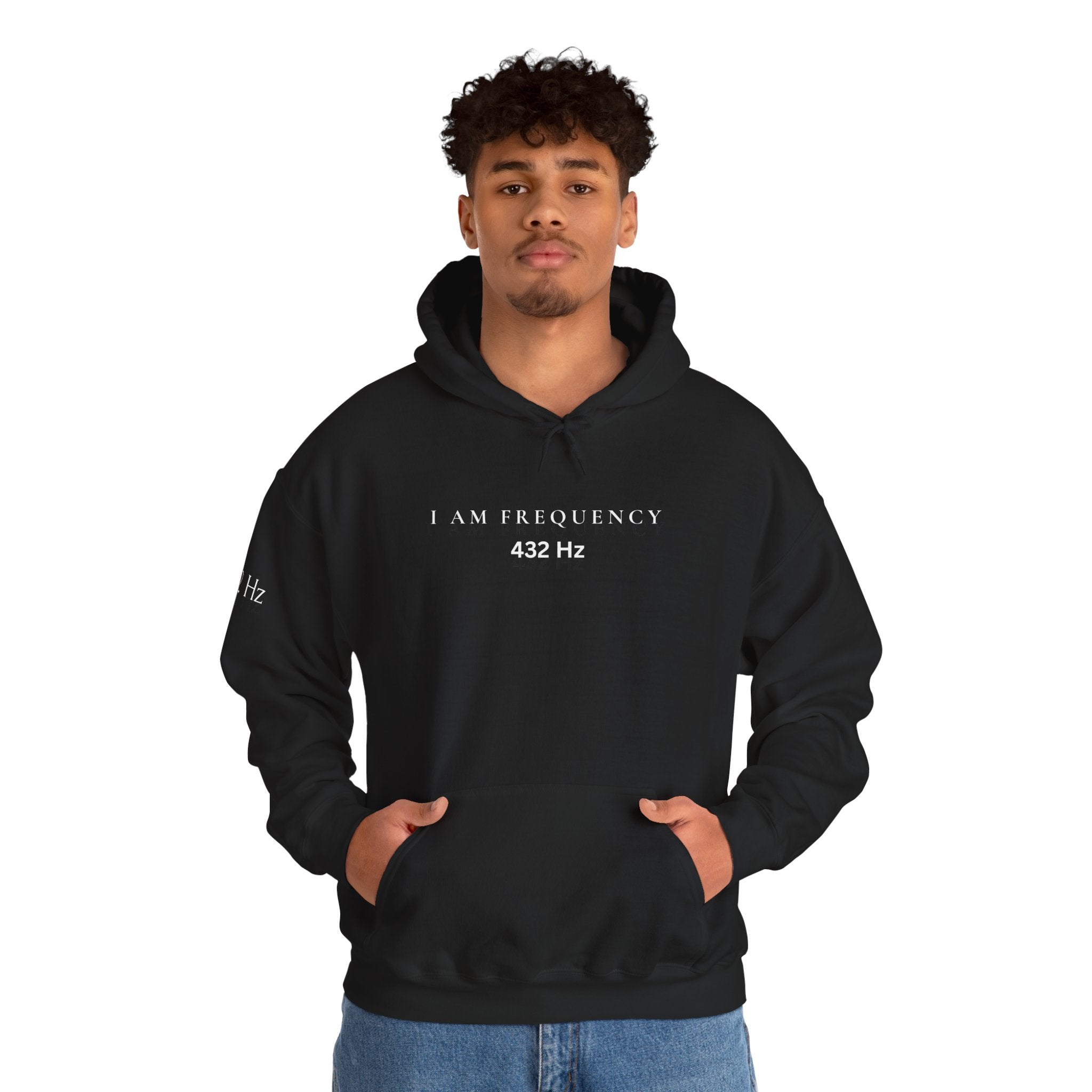 Man wearing a black hoodie with 'I AM FREQUENCY 432 Hz text on a white background