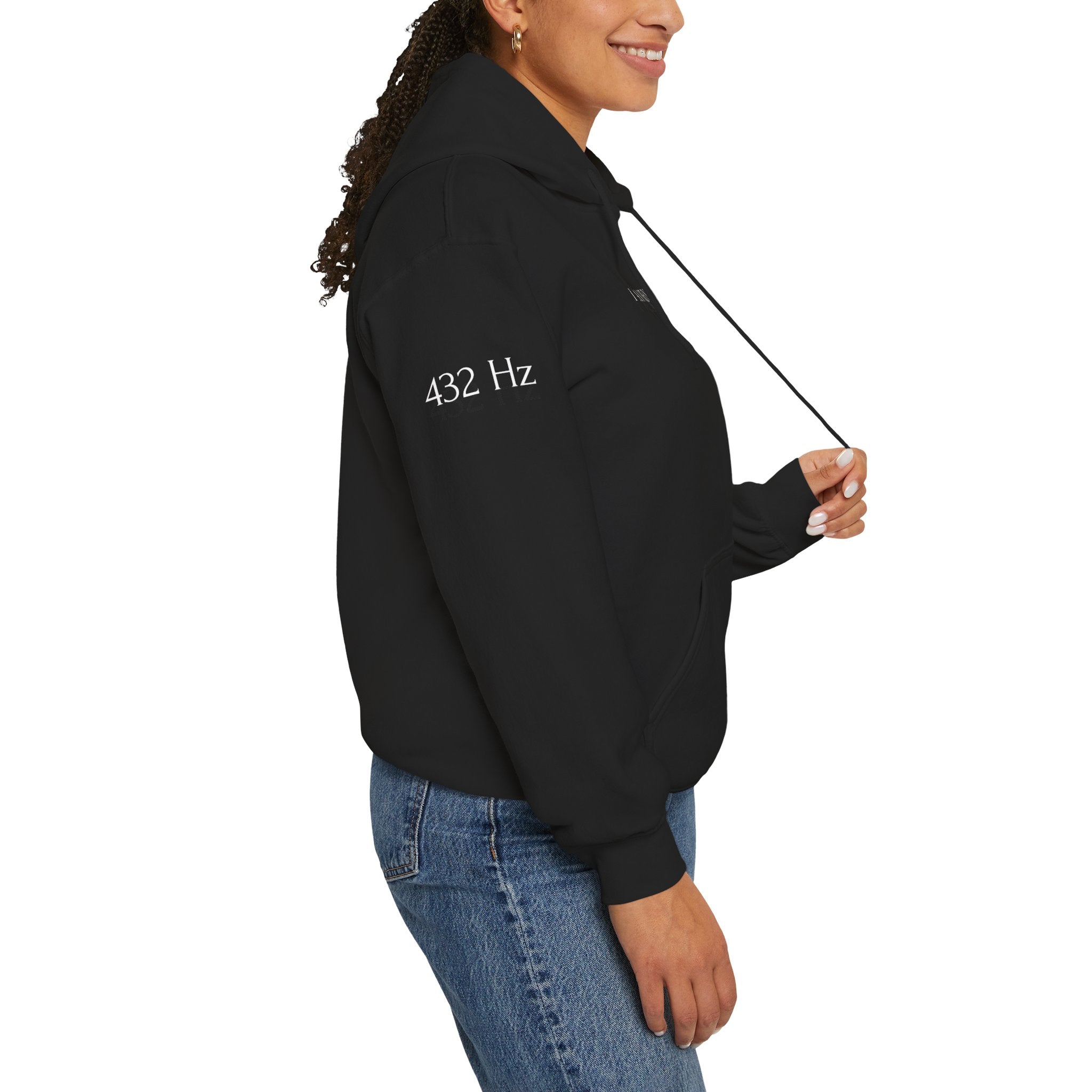 Person wearing a black hoodie with '432 Hz' text on a white background