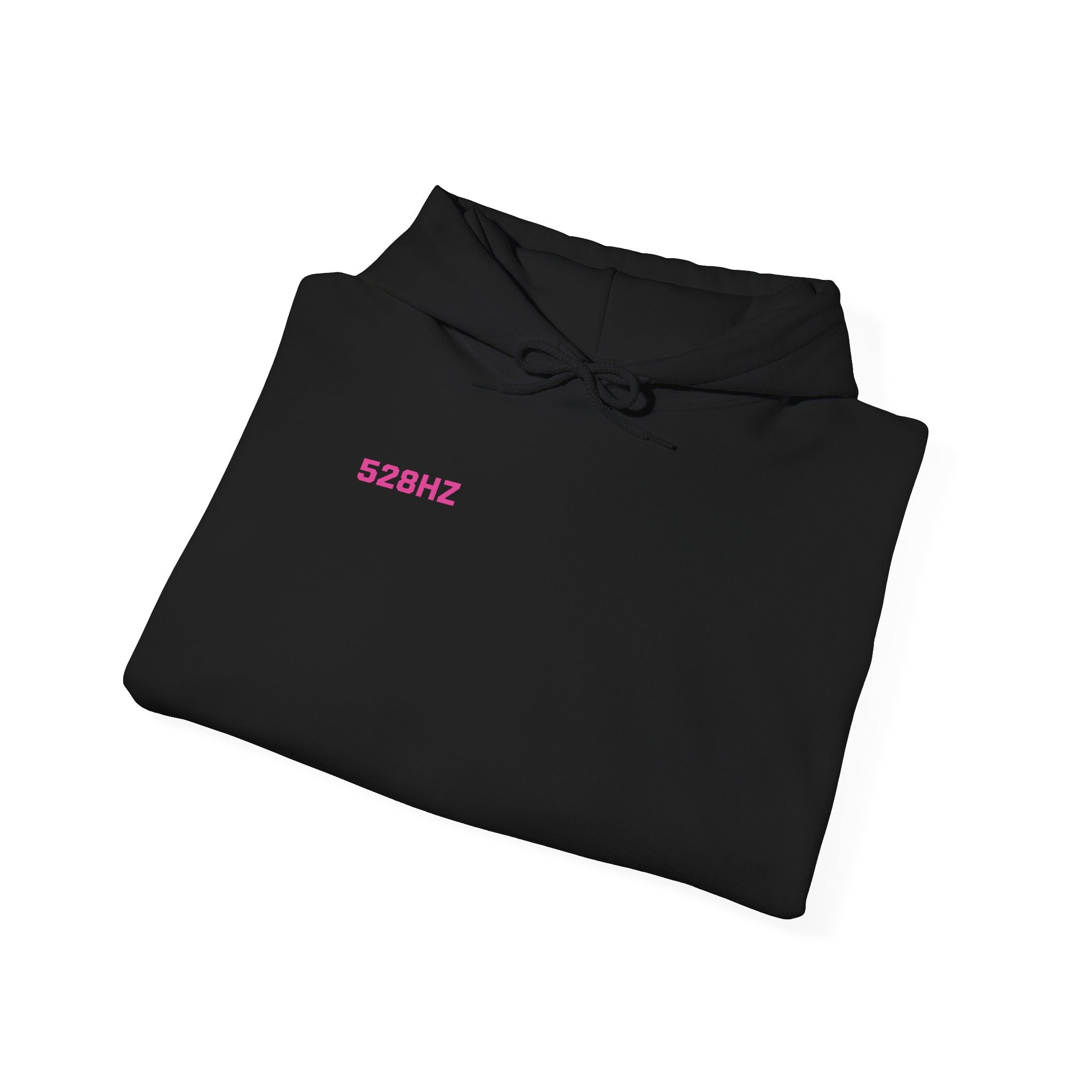 Folded black shirt with pink text on a white background