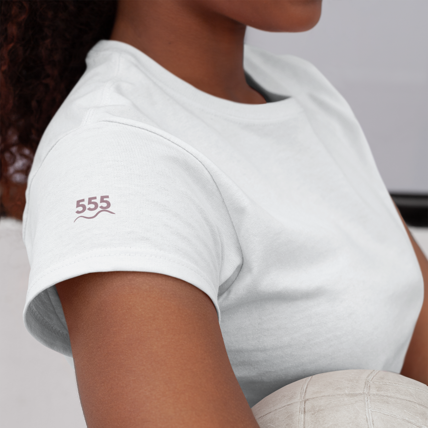 White Aura T-shirt with 555 angel number and wave line printed on the sleeve in mauve. A symbolic nod to change, freedom, and alignment.