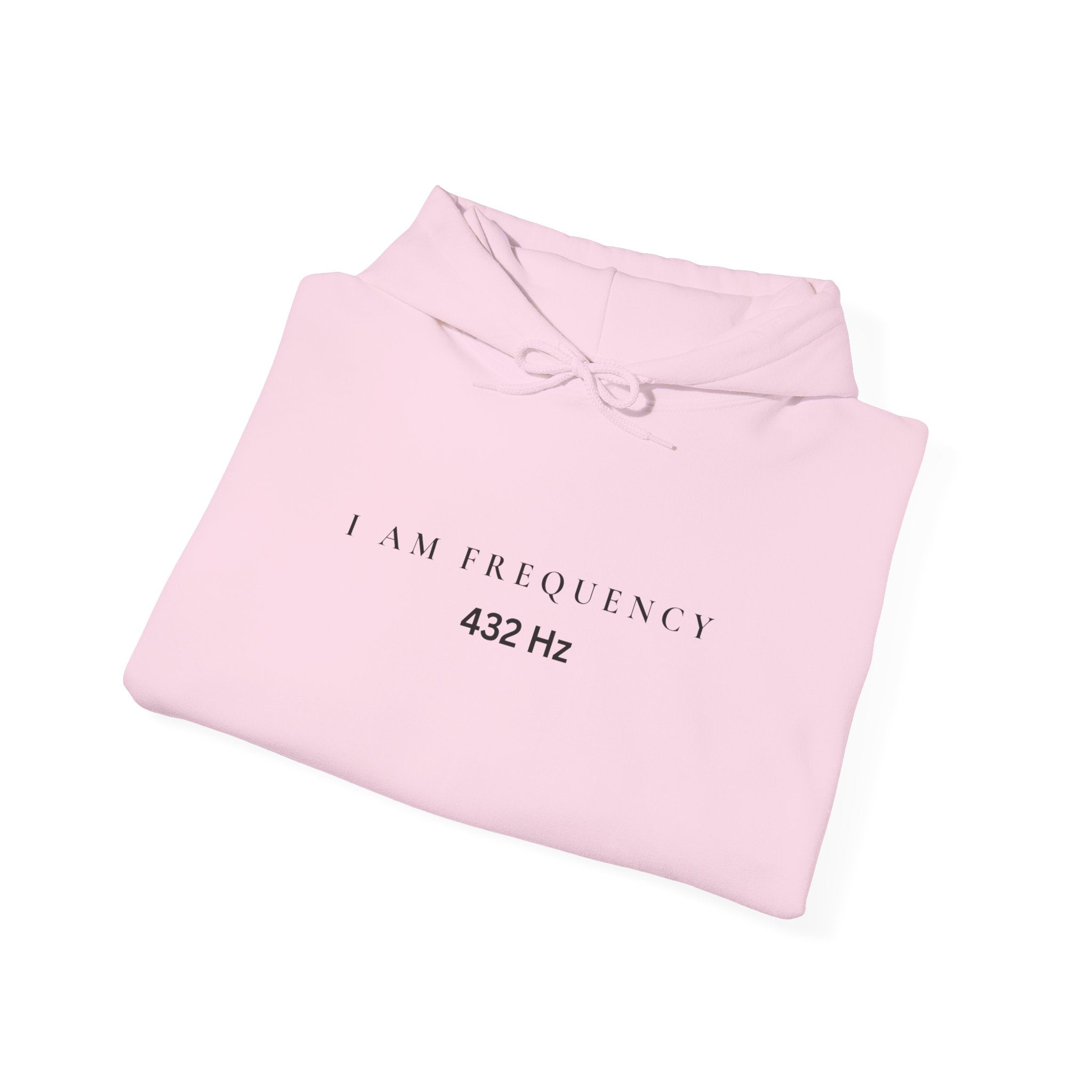 Folded pink pulse hoodie with 'I AM FREQUENCY 432 Hz text on a white background